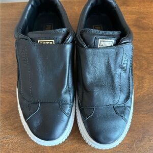 Puma Black Leather Slip-On Sneakers with White Soles